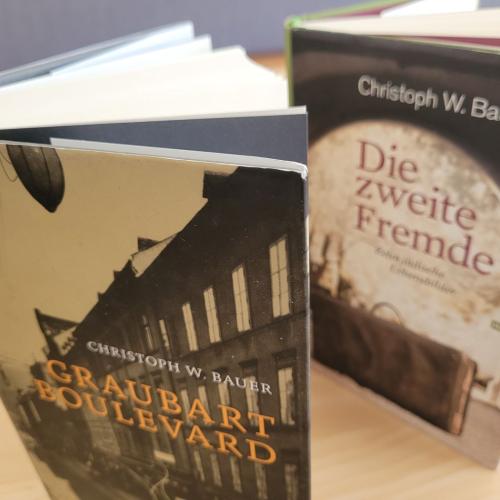 Zwei Bücher von C. W. Bauer: "Graubart Boulevard" und "Die zweite Fremde"